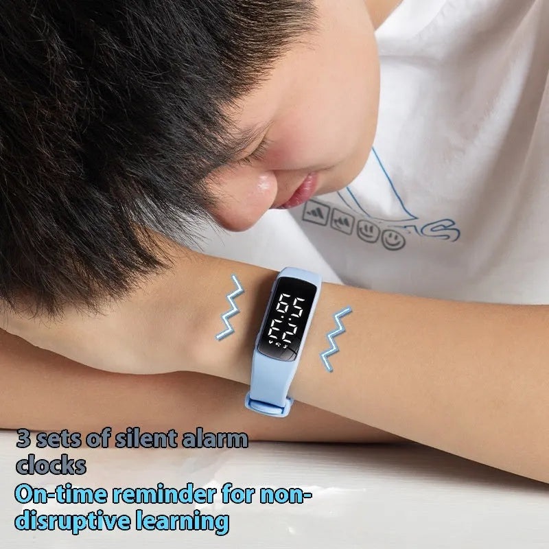 Waterproof smart watch with vibration alarm, LED display, and silicone strap in multiple colour options