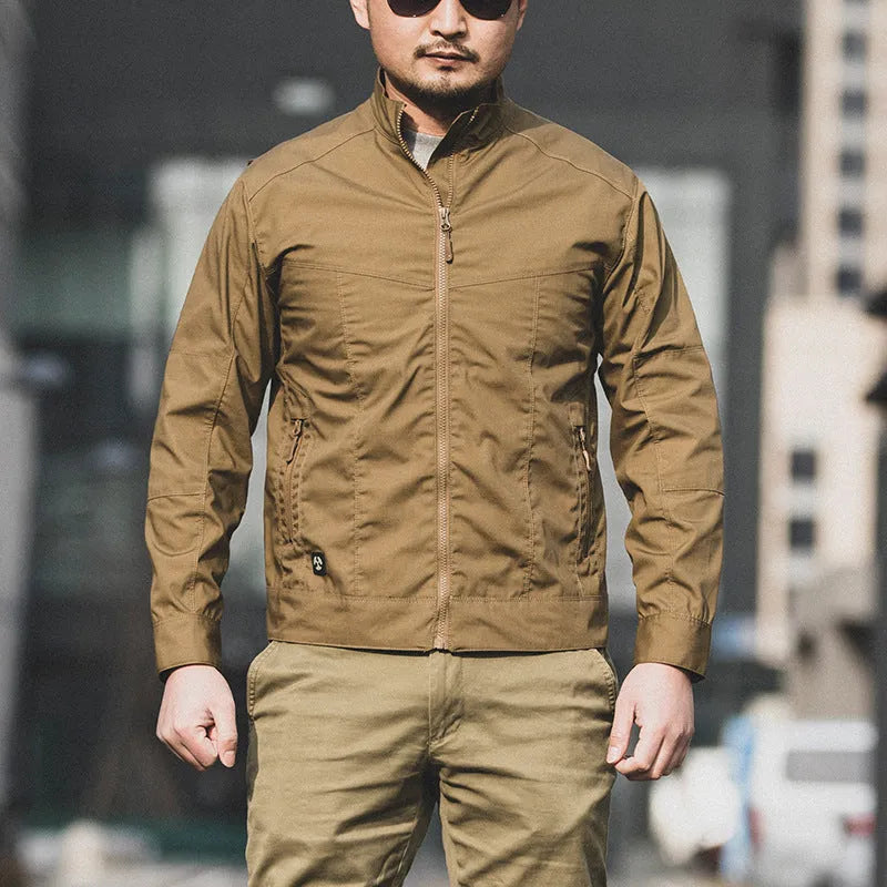Men's tactical camouflage coat in polyester with multiple pockets for outdoor wear