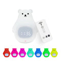 A white silicone night light shaped like a bear with a sleep timer and remote control.