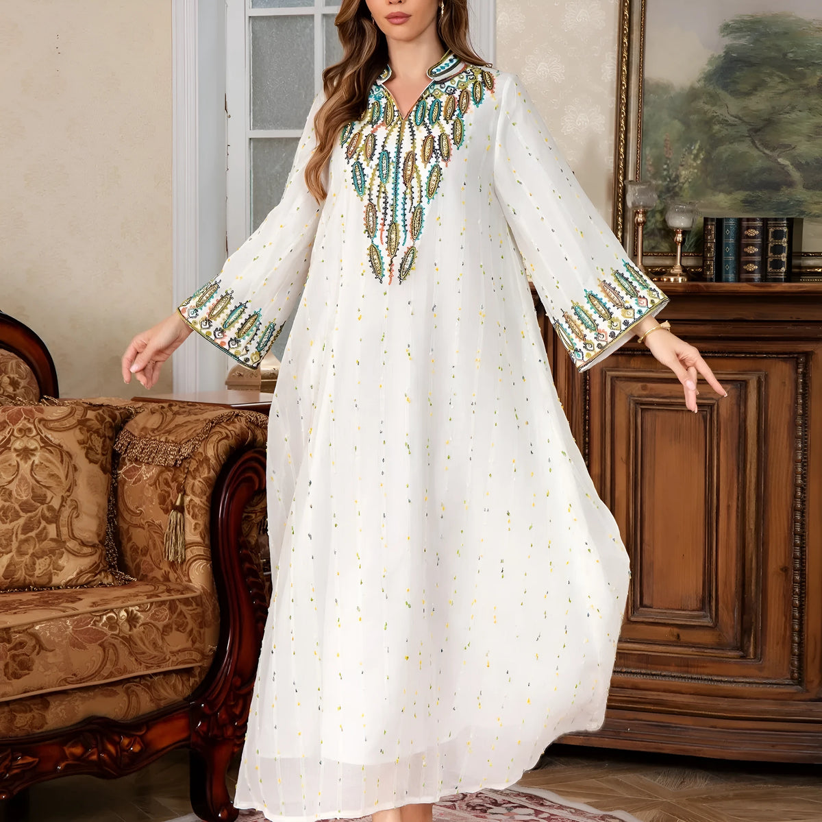 White polyester Arabic robe for women with long sleeves and long skirt.