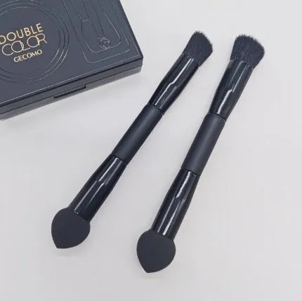 Double-headed makeup brush with black miter sponge and artificial fibre bristles on wooden handle