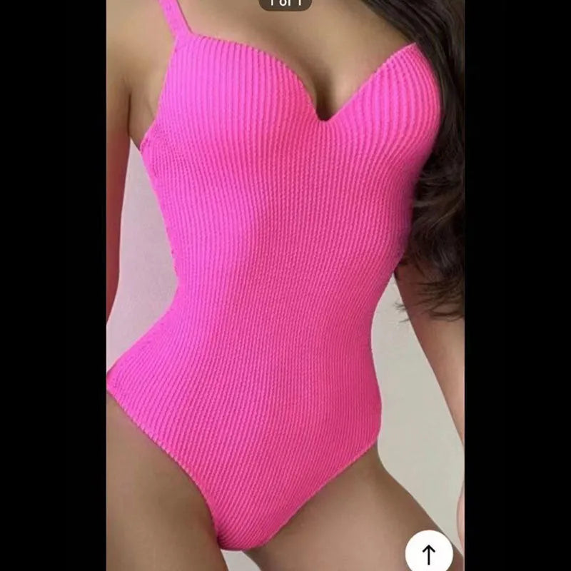 Women's sleeveless one-piece swimsuit in polyester for swimming, shown in solid colour options.