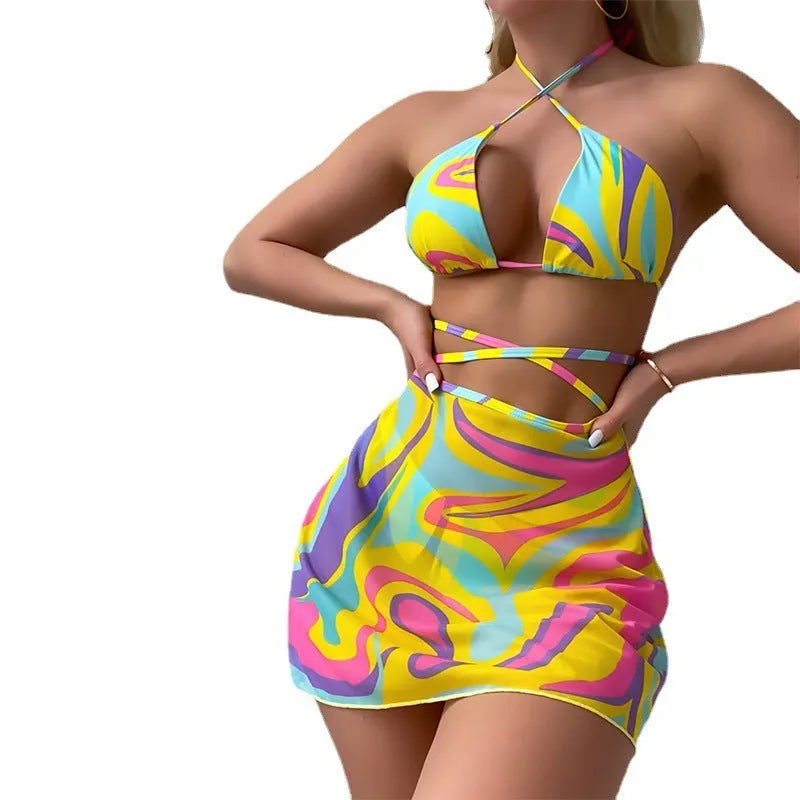 Yellow striped halter-neck lace-up bikini top with matching skirt and shorts.