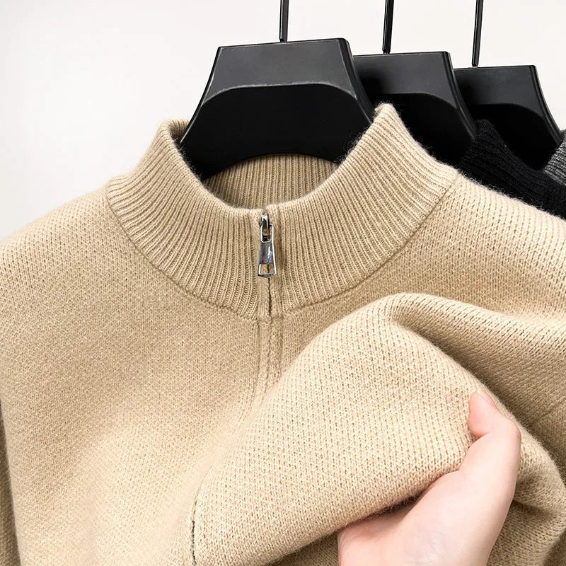 Men's black stand collar zipper cardigan in a loose, thickened knit on a hanger.
