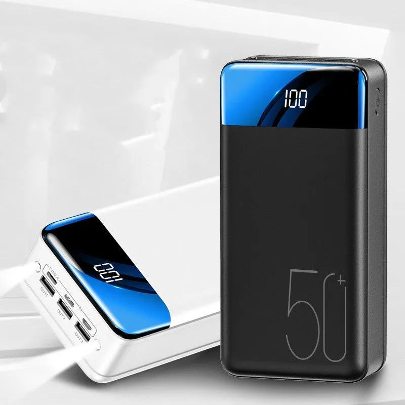 Large 50000mAh capacity power bank with three output ports in black plastic casing