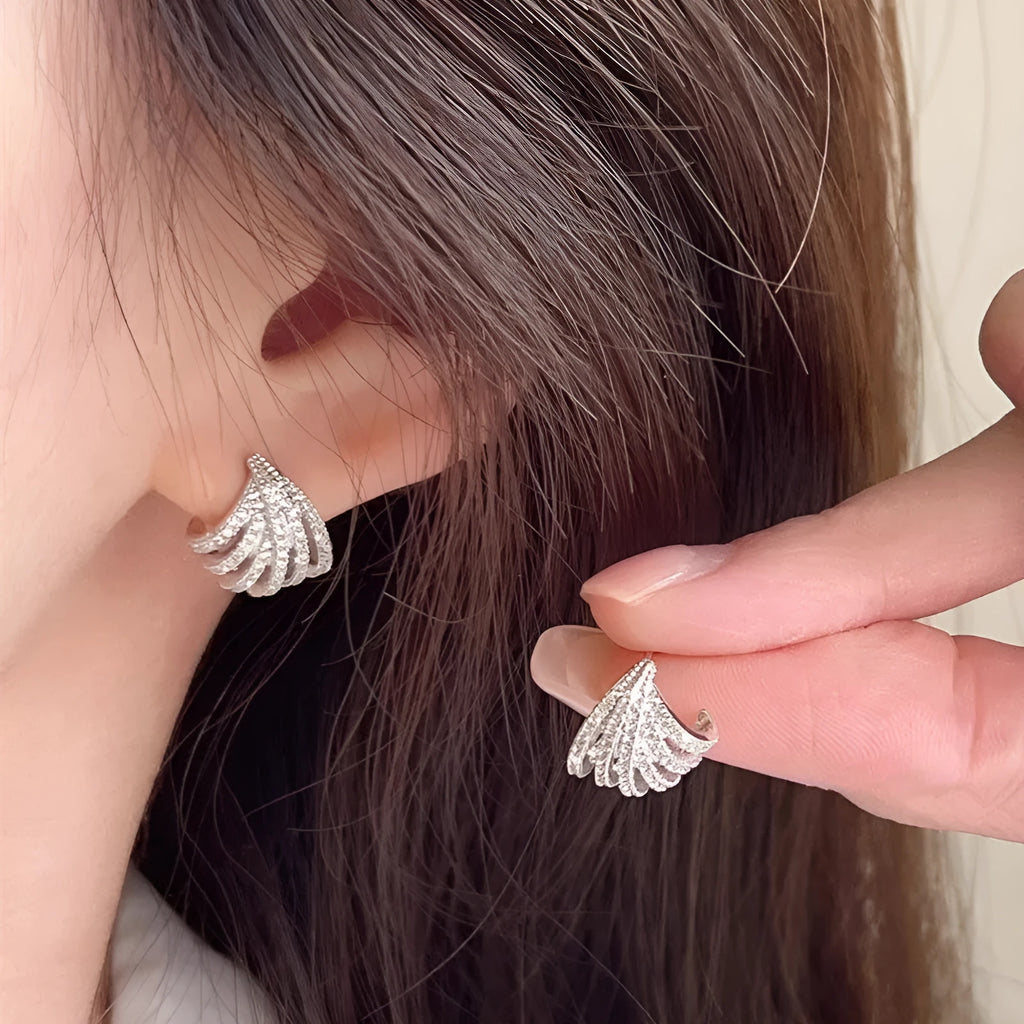 Geometric zircon earrings with platinum electroplated finish and European-American design style