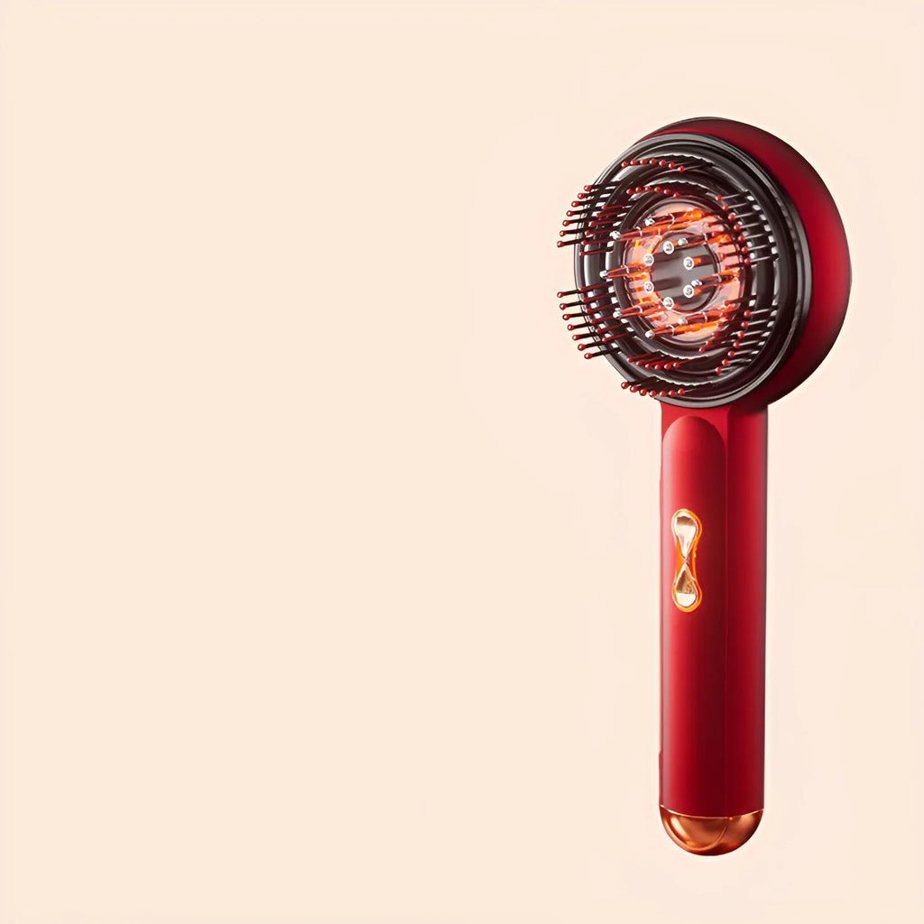 Black and red plastic massage hair comb with red and blue lights showing 24cm length