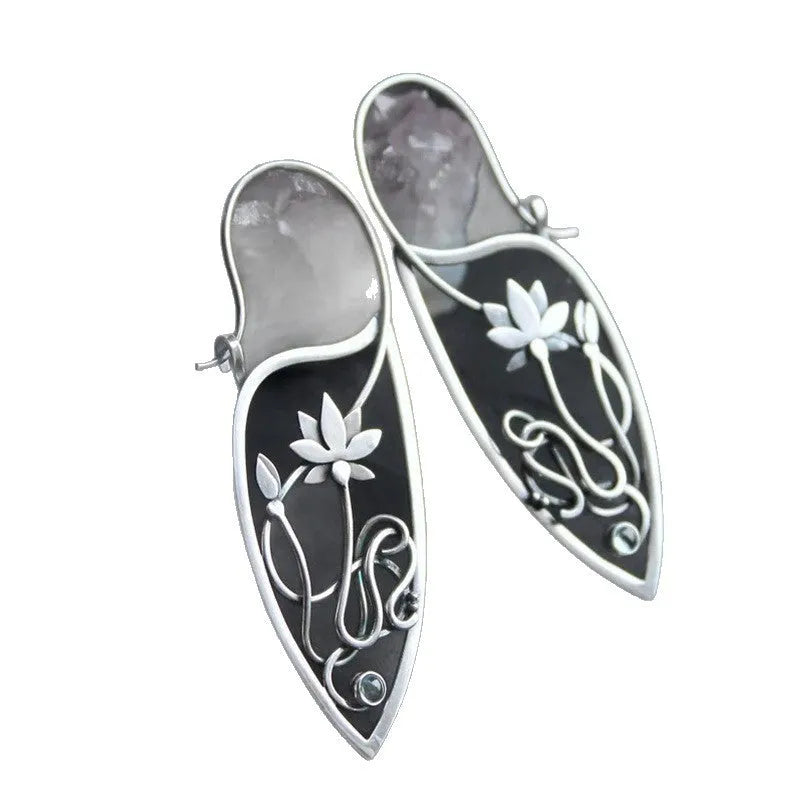 Silver lotus vine floral earrings with geometric elements and rhinestone accents