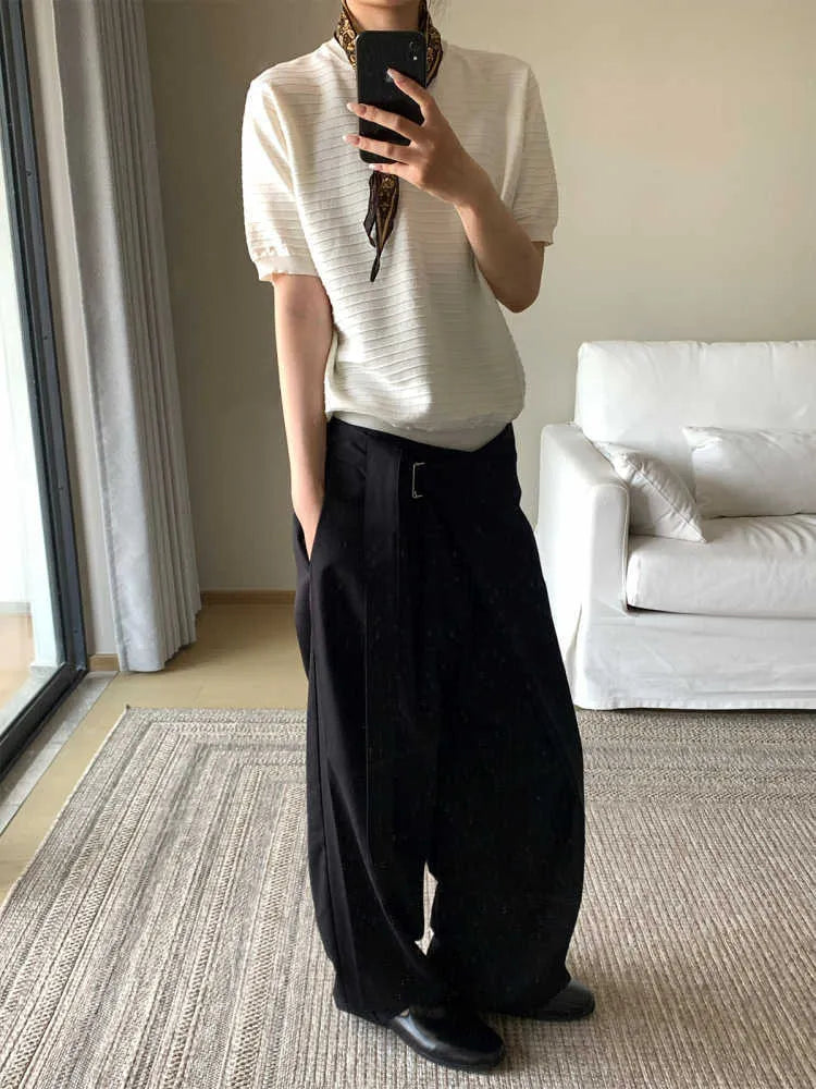 Black straight-leg trousers with adjustable waist and single pleat detail in Tencel cotton fabric