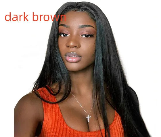 Long straight black synthetic wig with centre-parted bangs on a model