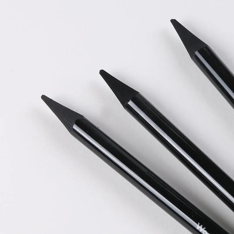 Set of six graphite pencils and three carbonized pencils packaged on a white suction card.