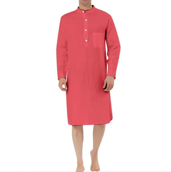 Man wearing a light blue cotton shirt robe with a simple chest pocket.