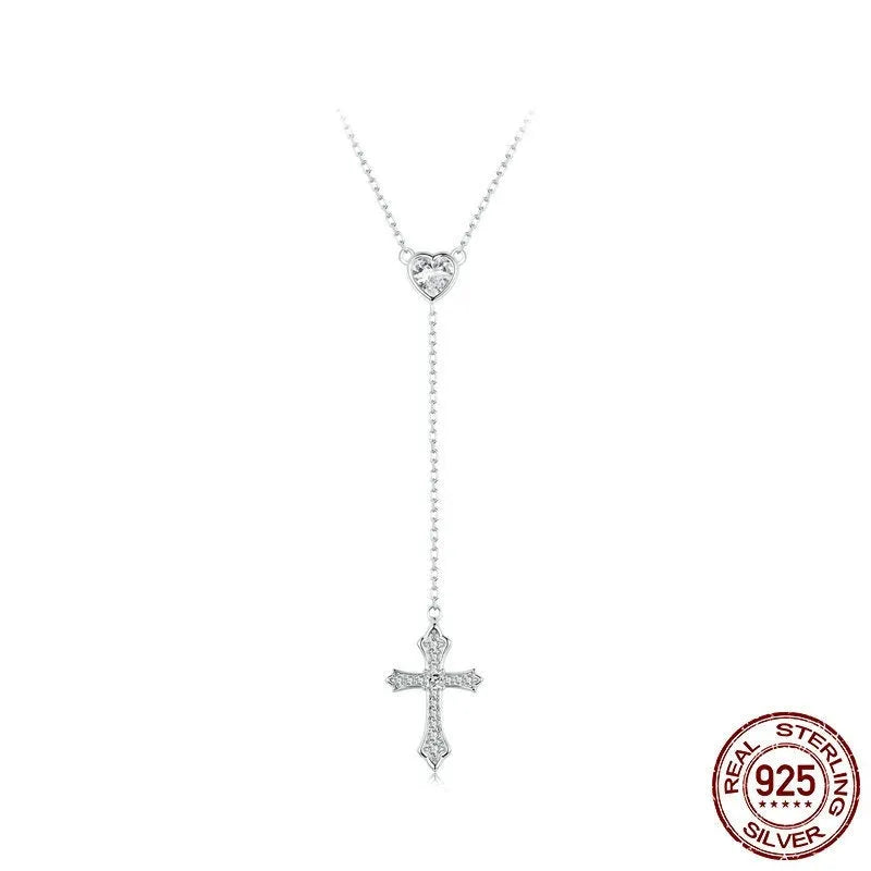 Silver necklace with a small cross pendant on an O-ring chain, shown in colour BSN384.