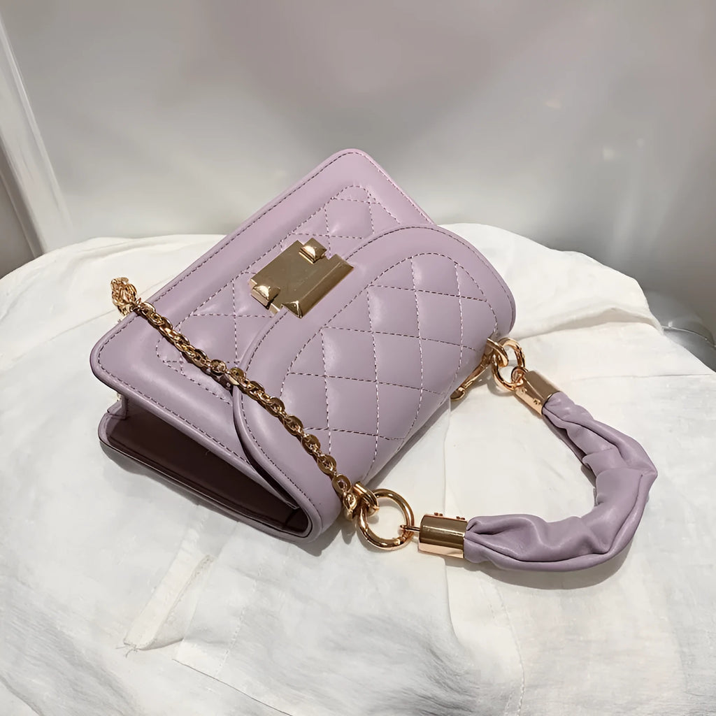 Purple rhombus square women's shoulder bag with crossbody strap on mannequin