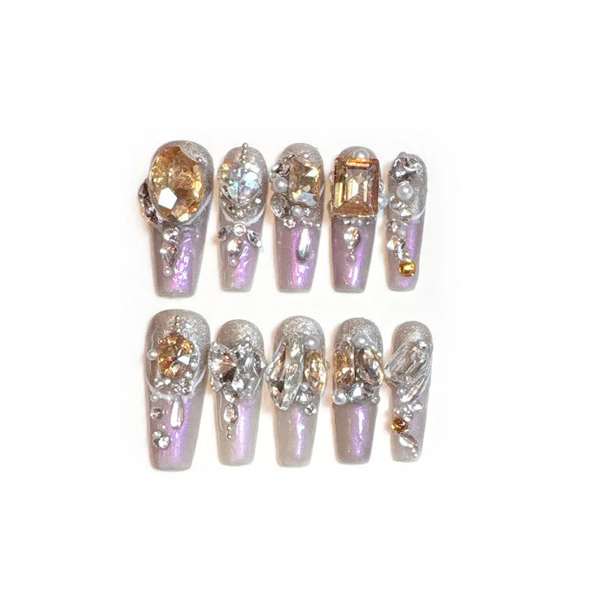 Reusable false nail patches with jelly adhesive or tool set options in 10-piece card packaging