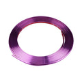 Galvanised purple PVC wheel hub trim on car wheel showing decorative application