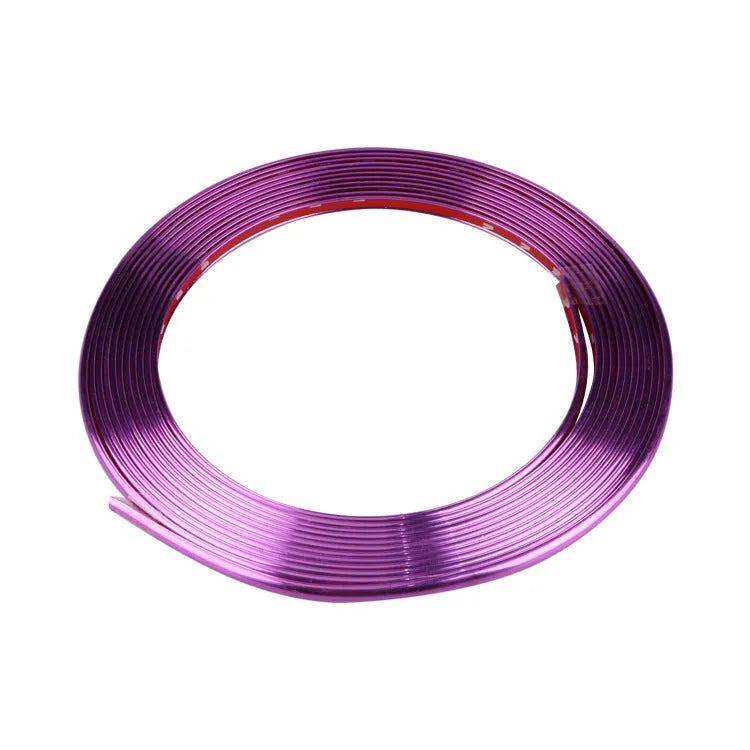 Galvanised purple PVC wheel hub trim on car wheel showing decorative application