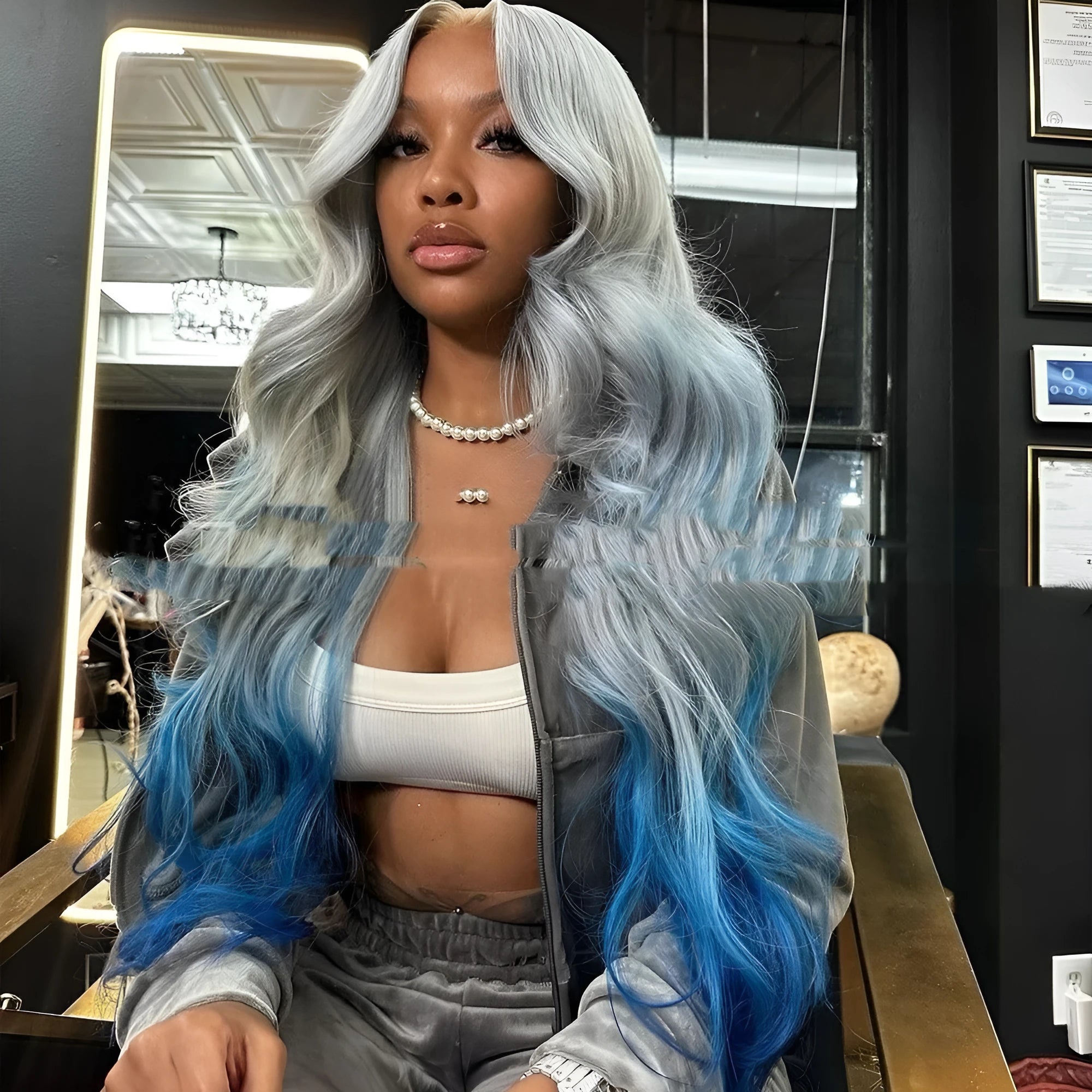 Grey blue gradient human hair lace front wig on a stand, showing long length and natural hairline.