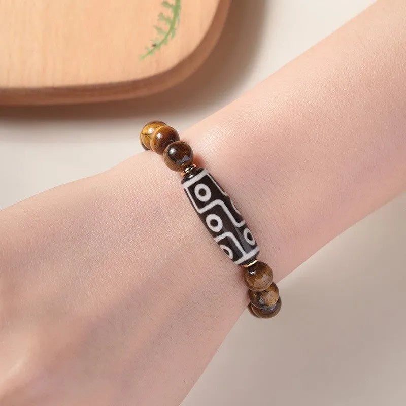 Ethnic tigereye single circle Buddha rosary bracelet showing bead details and spiritual design