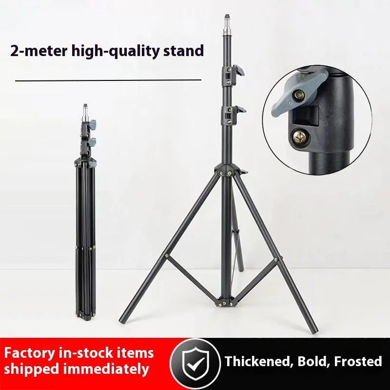 Frosted finish tripod light stand with extended legs and mobile phone holder mounted