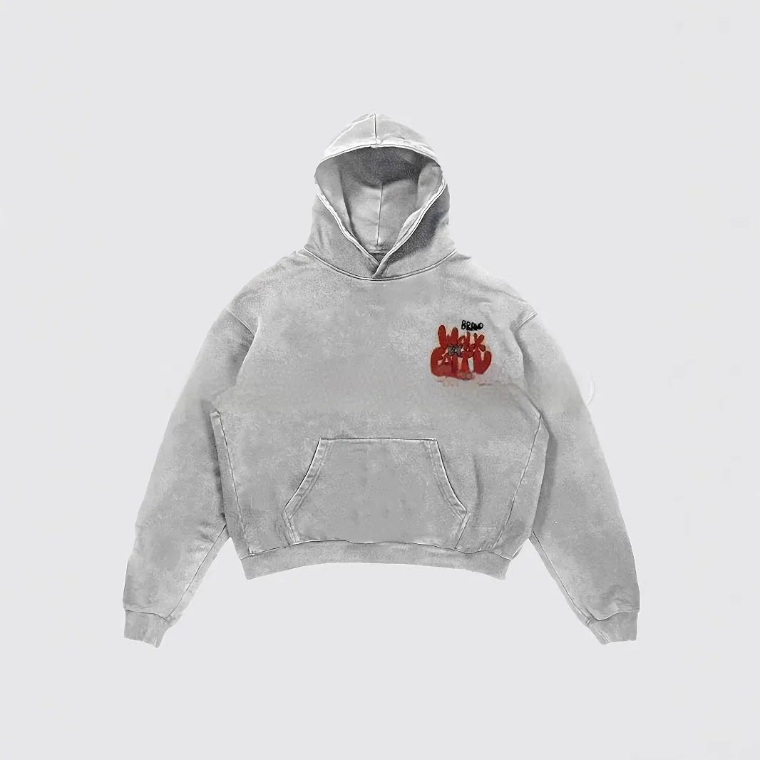 Women's grey hoodie with large black letter print on the front, long sleeves, and a pocket.