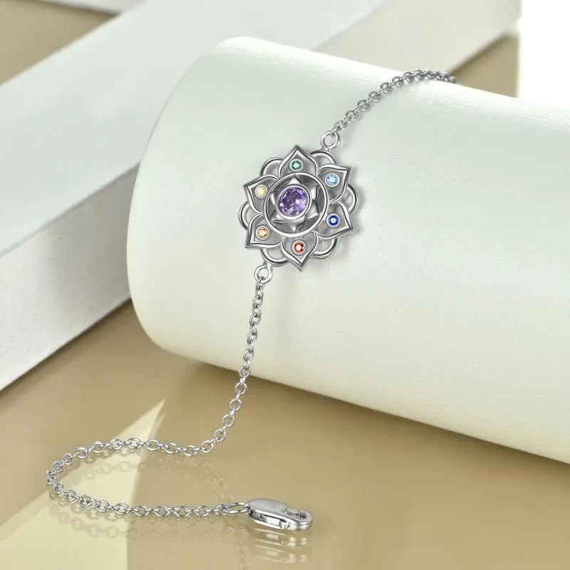 Seven chakra lotus pendant bracelet in sterling silver with white gold plated finish and adjustable cable chain