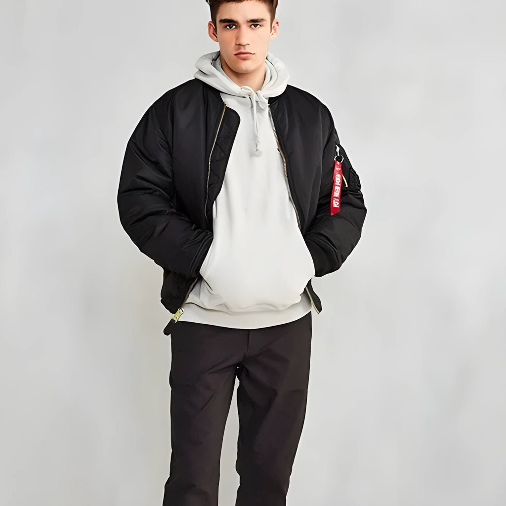 Men's army green loose-fitting nylon pilot jacket with cotton padding from American workwear collection.