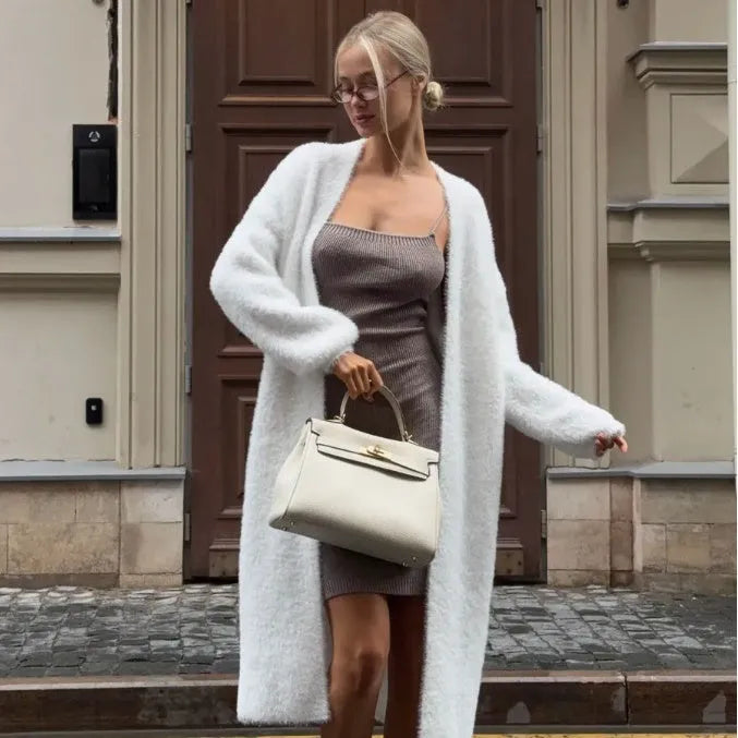 White long knitted cardigan jacket on a model, showing loose fit and 105cm length.