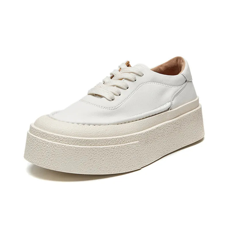 Women's black platform casual shoes with embossed cowhide texture and rubber sole