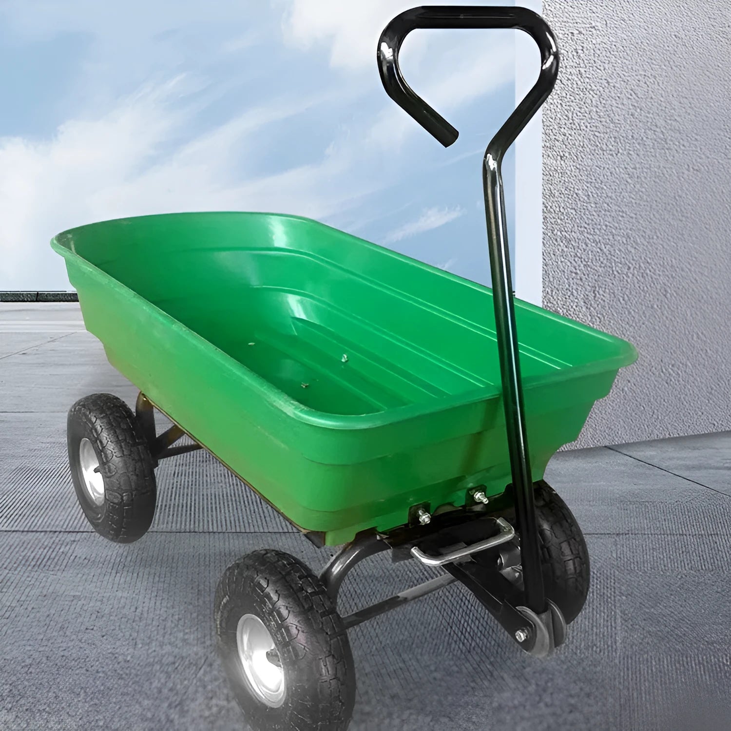 Green four-wheel plastic dump truck with steel PP construction and a tilting cargo bed.