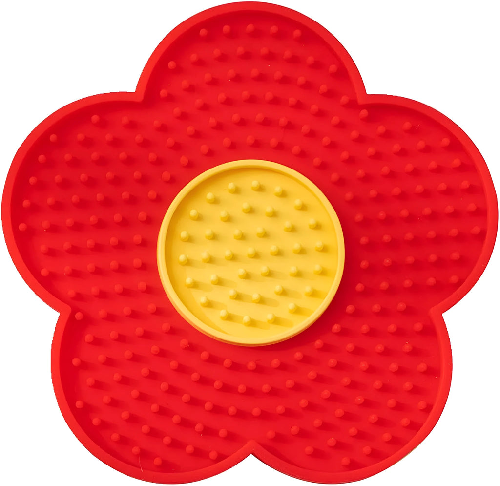 Flower-shaped silicone pet licking mat with suction cups in blue, grey, pink, purple, or red.