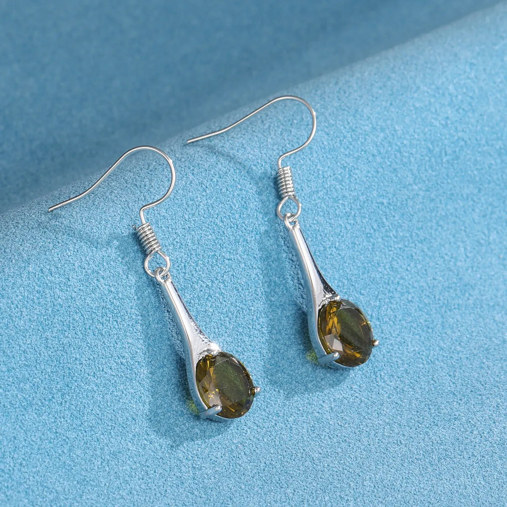 Olive green topaz drop earrings with minimalist water drop shape on alloy backing