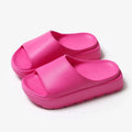 Women's beige thick-soled EVA slippers with a 5.5cm platform, shown from the side.