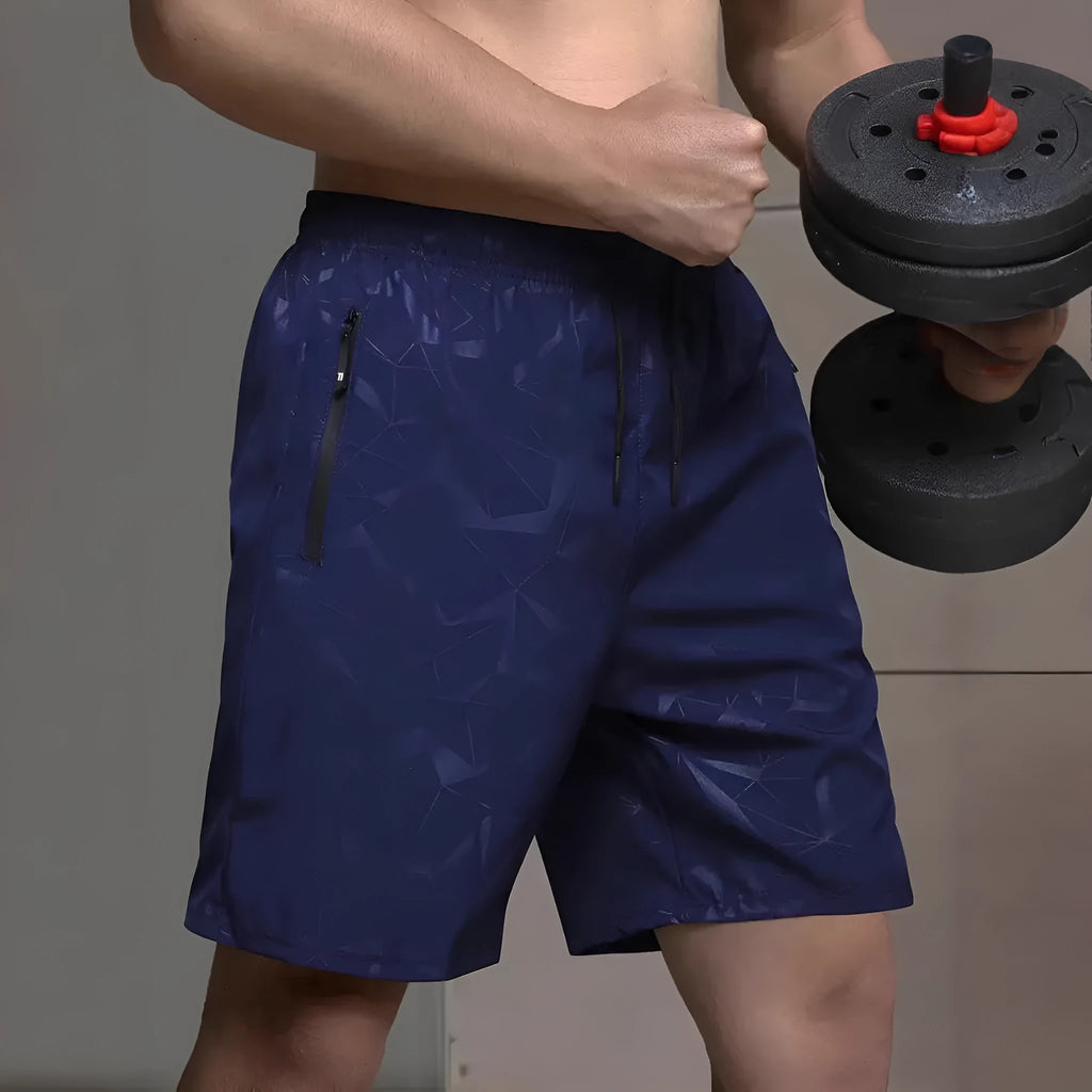 Men's loose fit sports shorts in polyester available in black, grey, and blue colours