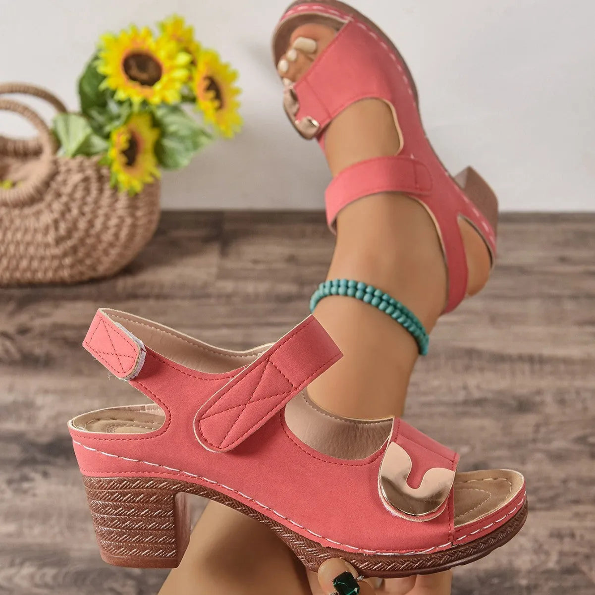 Women's light brown Velcro Roman sandals with round toe and rubber sole on a white background.