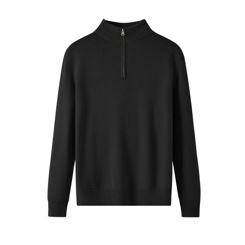 Man wearing a slim fit grey wool pullover sweater with long sleeves.