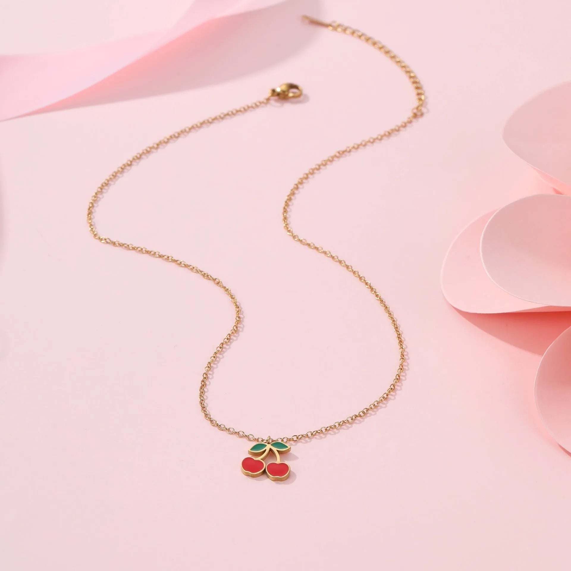 Cherry jewellery set with four 18K electroplated stainless steel pieces including necklace, bracelet, earrings, and ring