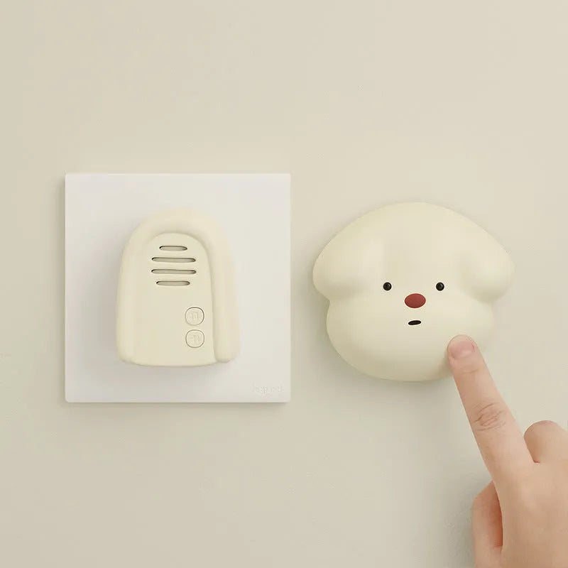 Household wireless plug-in doorbell with self-generating beeper in milky yellow or white colour
