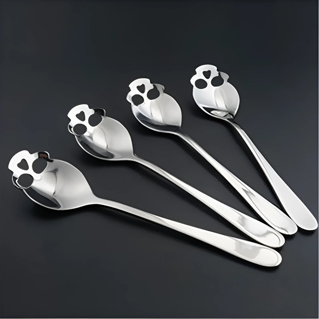 Stainless steel skull-shaped coffee mixing spoon in a colour finish