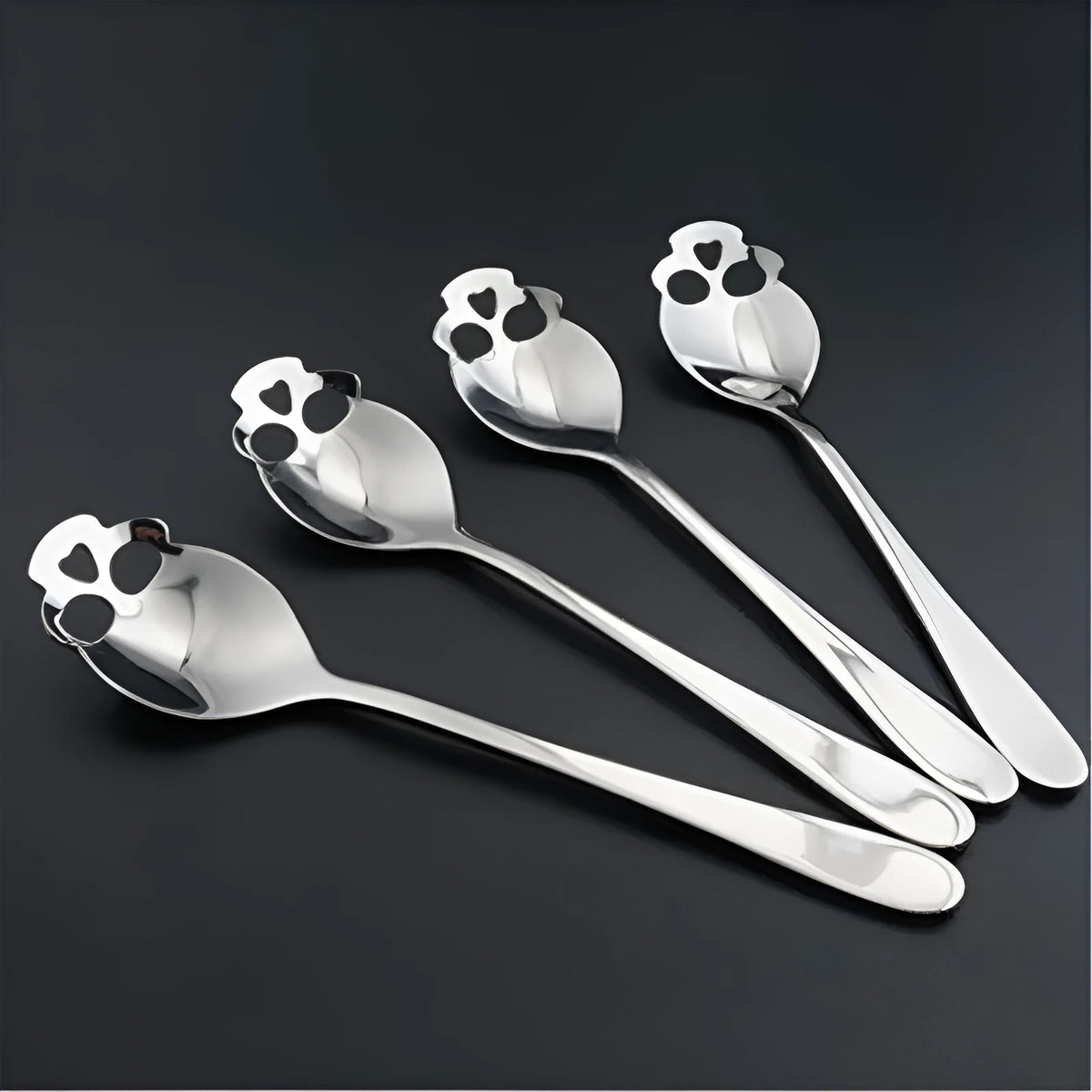 Stainless steel skull-shaped coffee mixing spoon in a colour finish