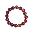 Watermelon crystal bead bracelet for women on a wrist, showing casual pastoral style.