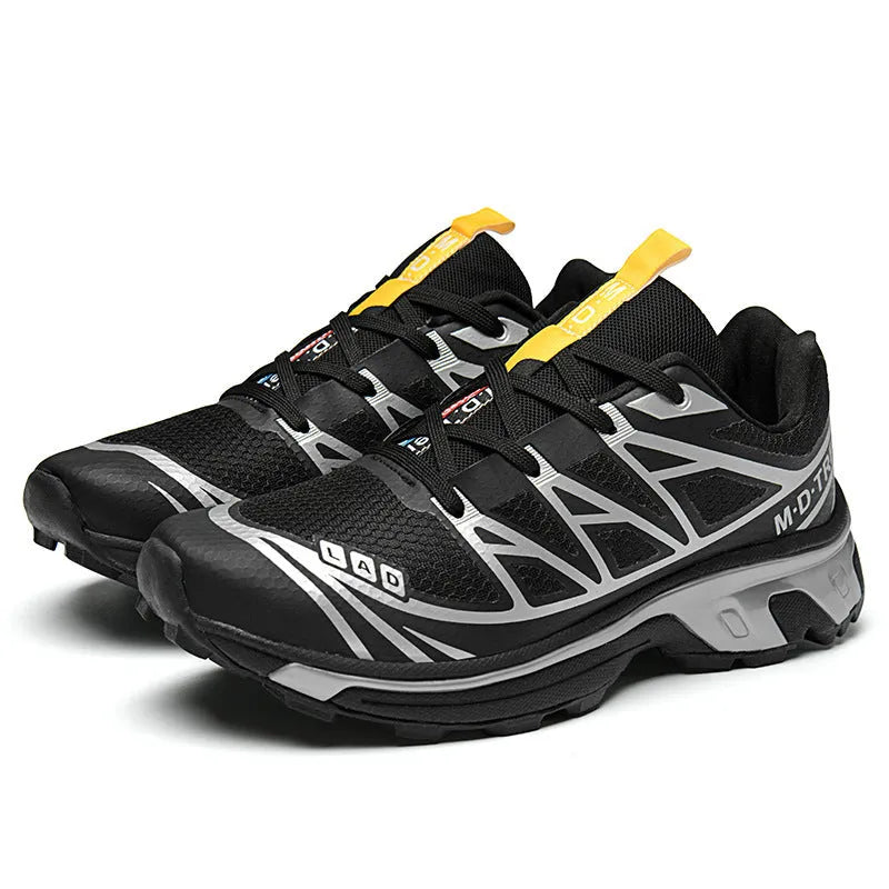 Low top hiking shoes in khaki with round toe, artificial leather upper, and flat rubber sole.