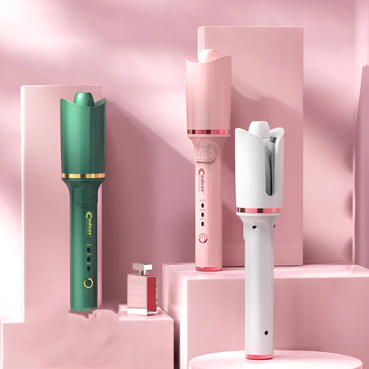 Lazy God electric rotating perm curler with tourmaline ceramic barrel, 21-30mm, in pink, green or white.