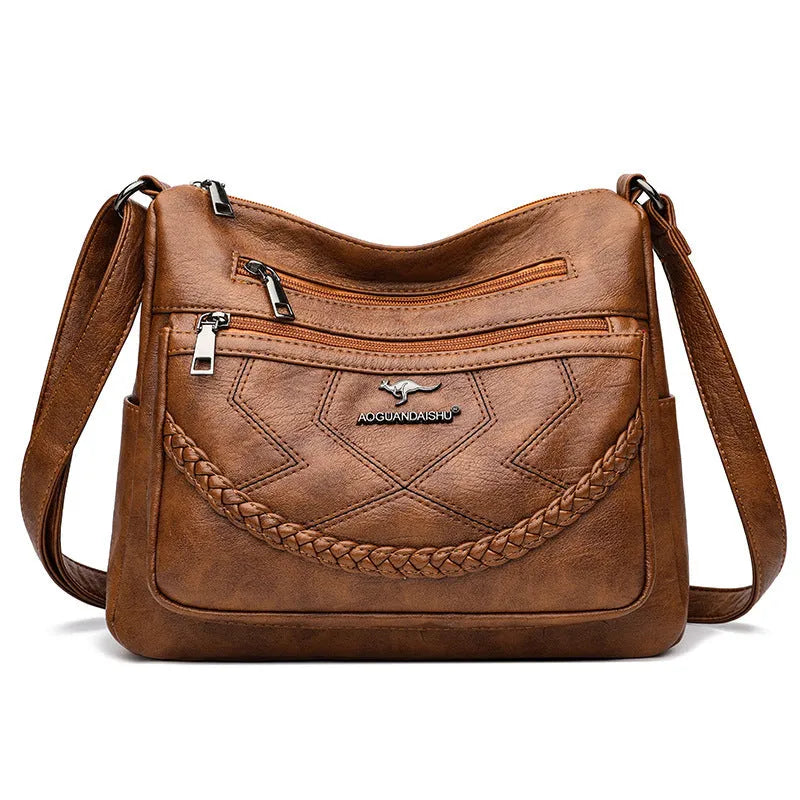 Soft PU leather shoulder bag with zippered compartments in horizontal square shape