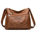 Soft PU leather shoulder bag with zippered compartments in horizontal square shape