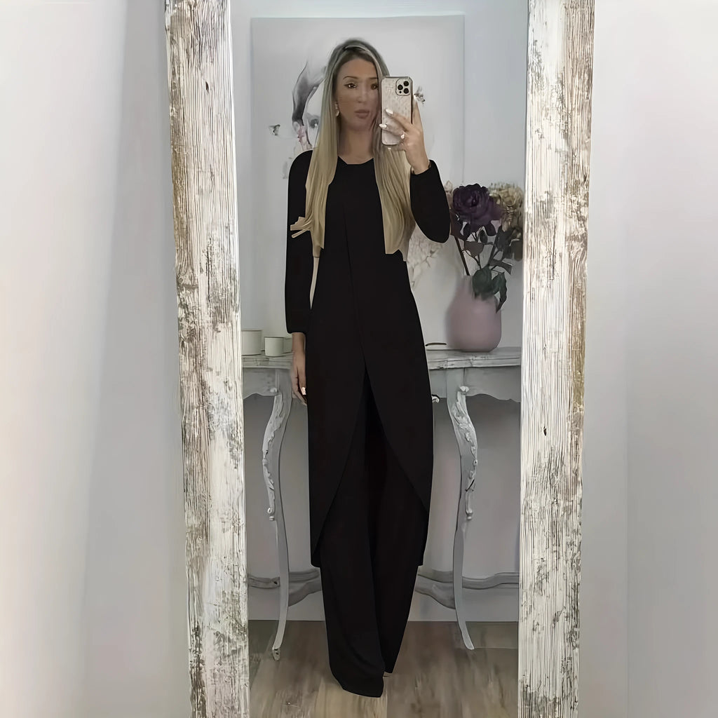 Loose fit casual tracksuit set in black, featuring a long sleeve round neck top and matching trousers