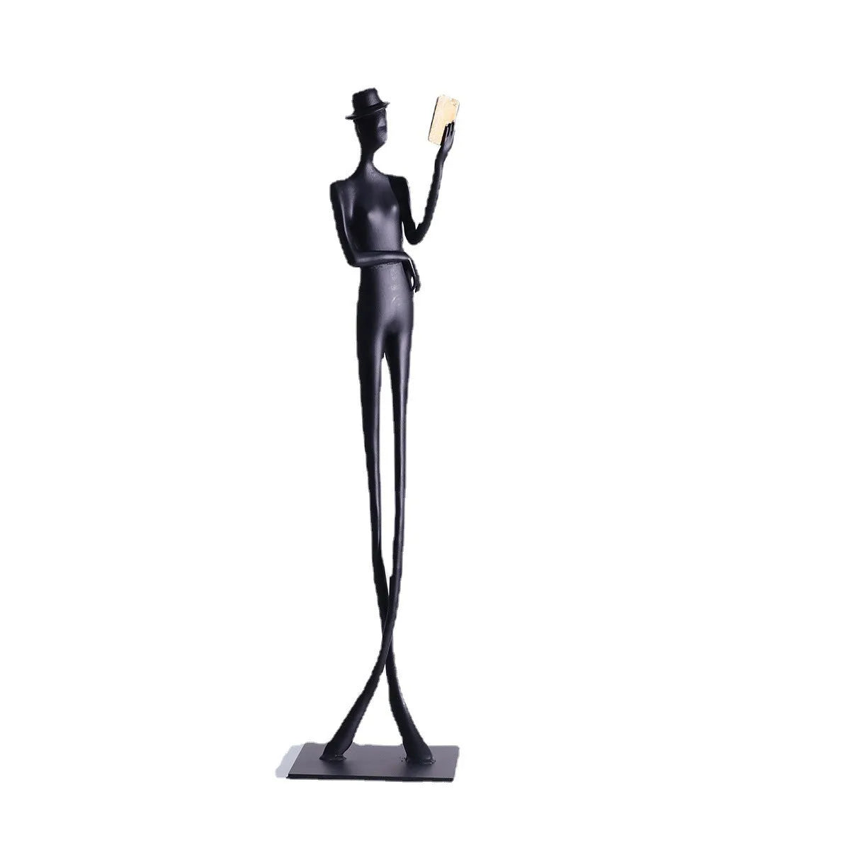 Black aluminium sculpture of reading woman for desktop decoration measuring 51cm tall