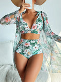 Women's multicolour printed bikini three-piece set showing sunscreen shirt, bra, and shorts.