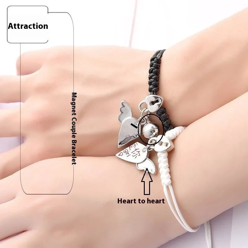Pair of silver alloy magnet clasp couple bracelets showing example designs like clover, crown, and love symbols.
