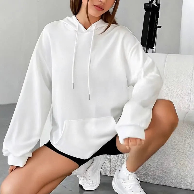 Women's loose grey drawstring pocket sweatshirt with long sleeves on a hanger
